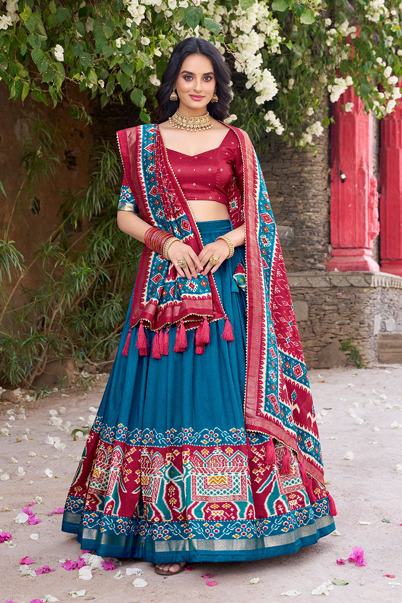 Firozi & Red Tussar Silk Sophisticated Foil Work Border Kalamkari Lehenga Choli