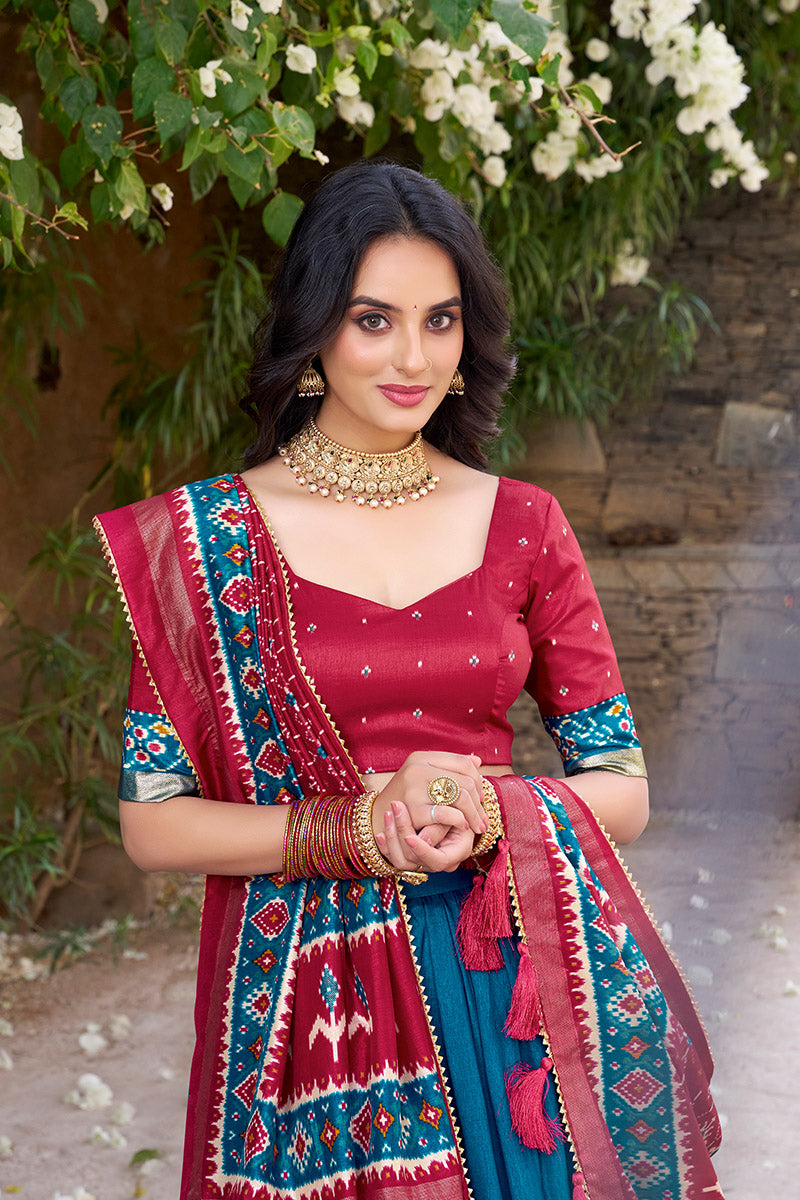 Firozi & Red Tussar Silk Sophisticated Foil Work Border Kalamkari Lehenga Choli