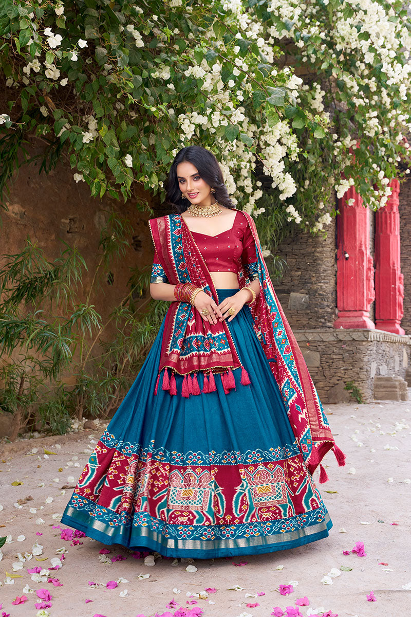 Firozi & Red Tussar Silk Sophisticated Foil Work Border Kalamkari Lehenga Choli