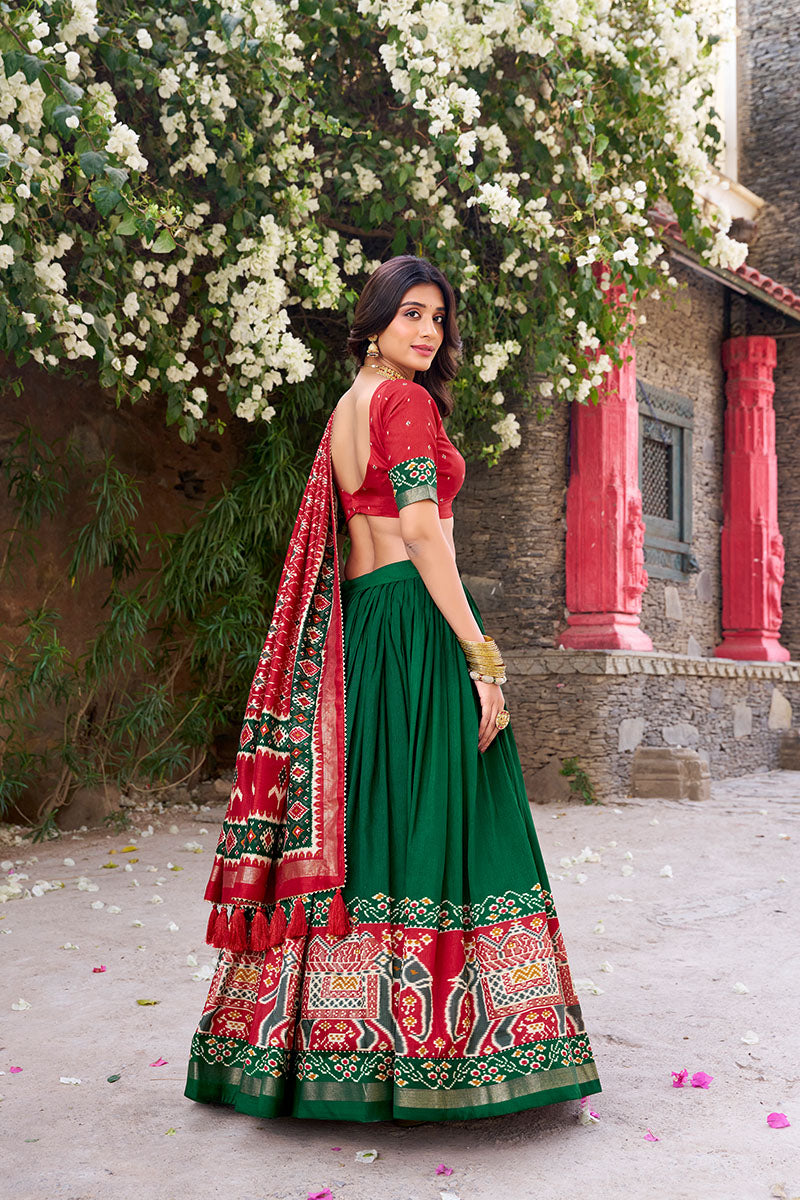 Elegant Green & Red Tussar Silk Sophisticated Foil Work Border Kalamkari Lehenga Choli