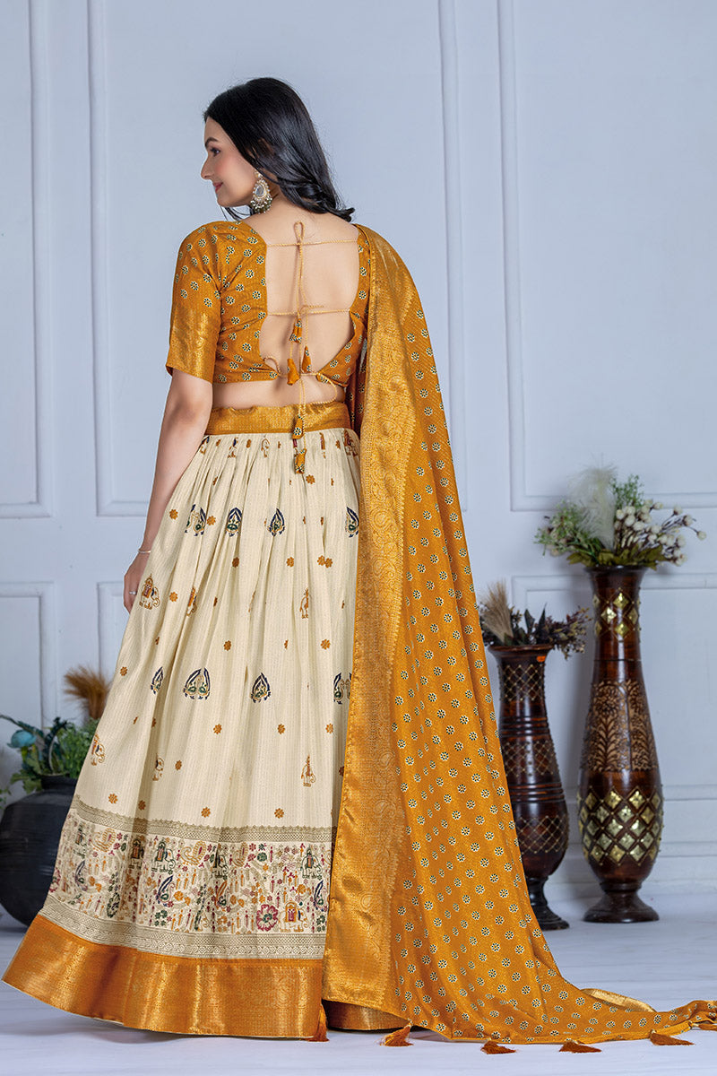 Elegant Beige And Mustard Yellow Lichi Fabric WIth Jacquard Border Printed Lehenga Choli Set