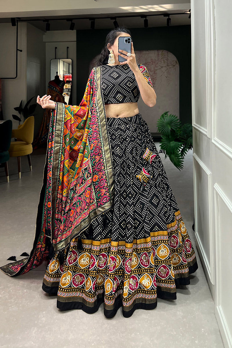 Elegant Black Bandhej Tusser Silk Lehenga Choli With Multicolor Dupatta