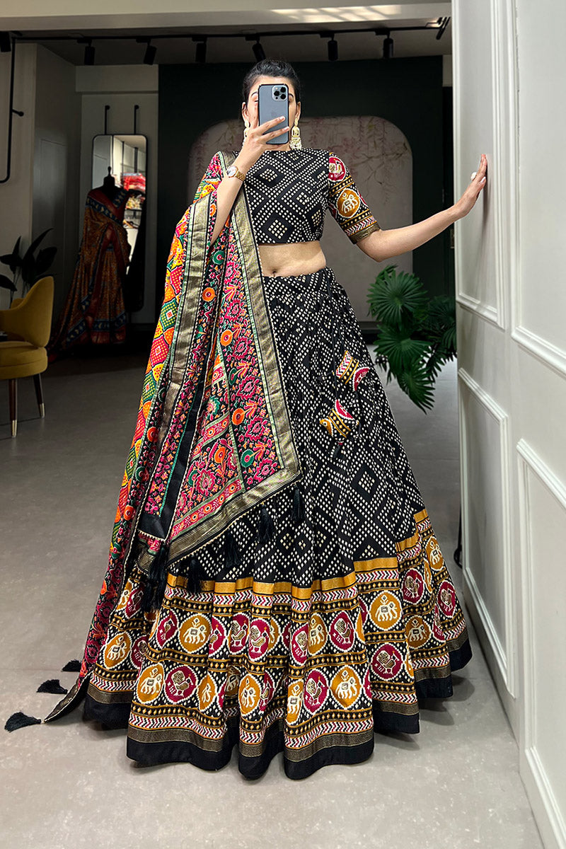 Elegant Black Bandhej Tusser Silk Lehenga Choli With Multicolor Dupatta