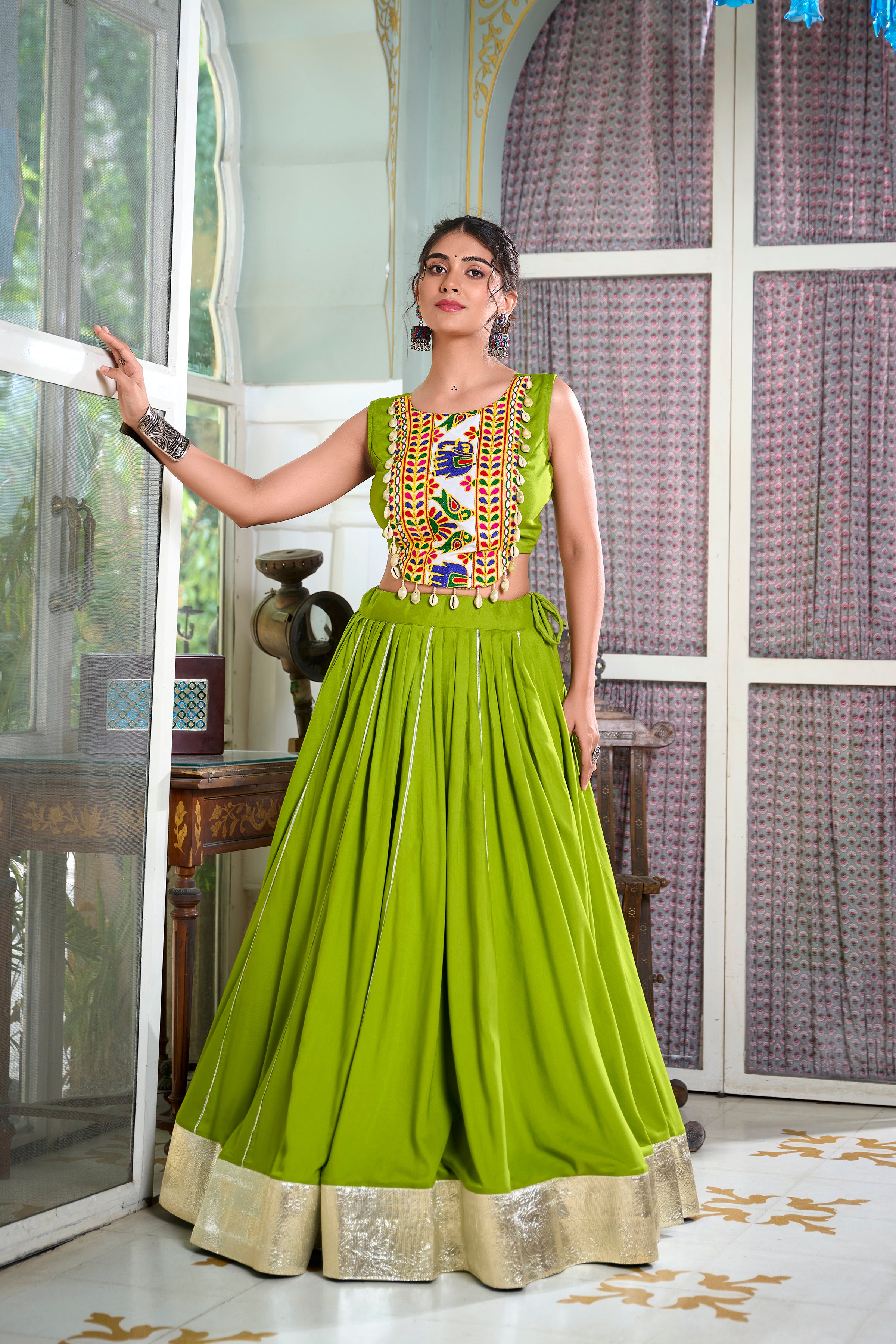 Sakhi Parrot Green Lehenga Choli with Gamthi Embroidered Blouse