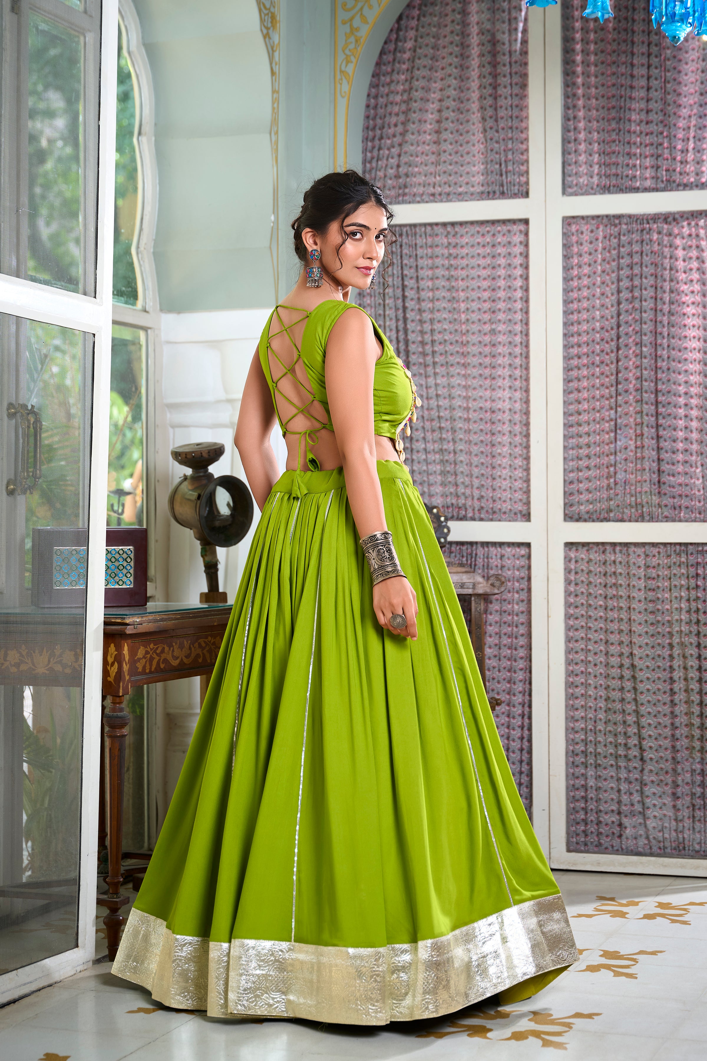 Sakhi Parrot Green Lehenga Choli with Gamthi Embroidered Blouse
