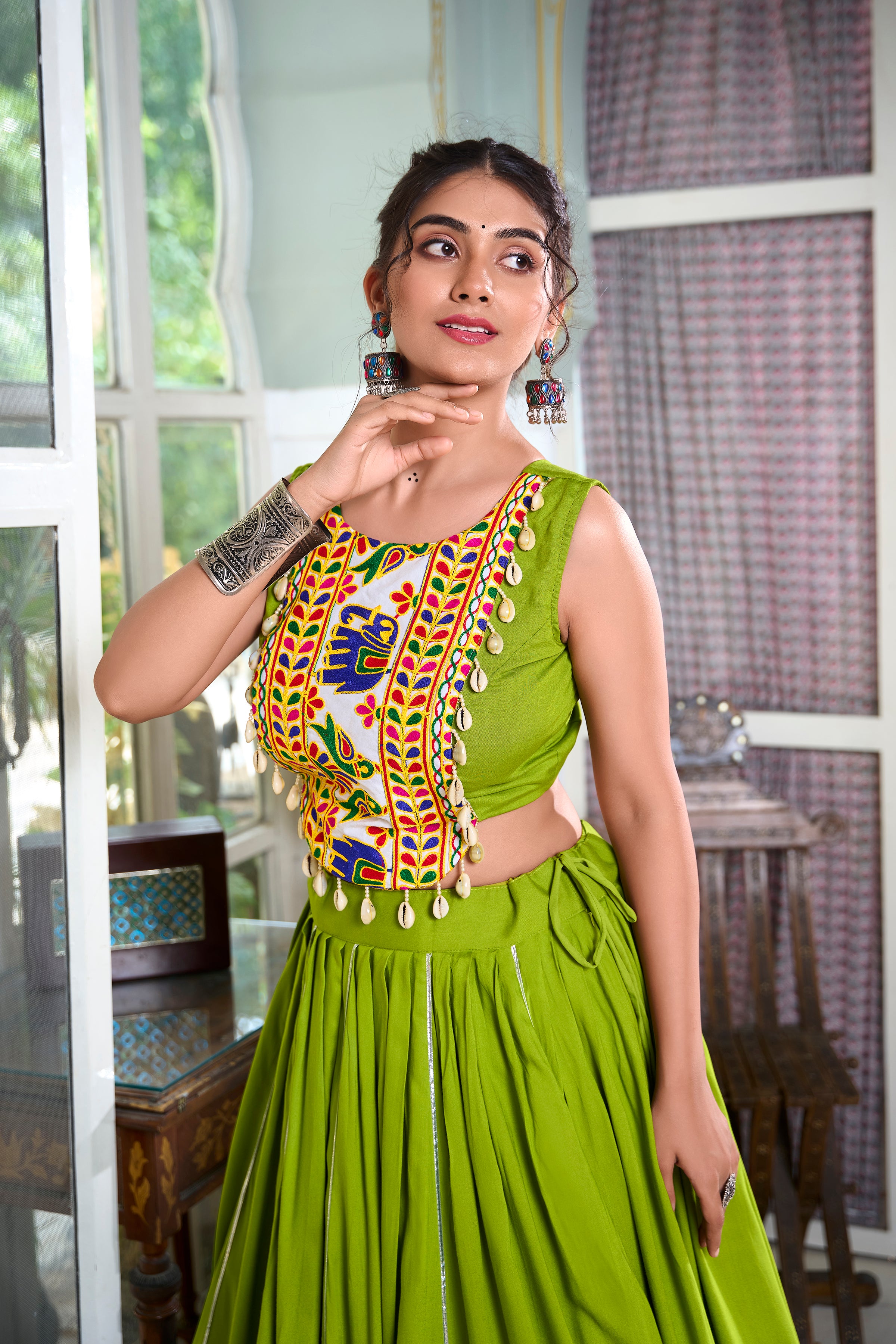 Sakhi Parrot Green Lehenga Choli with Gamthi Embroidered Blouse