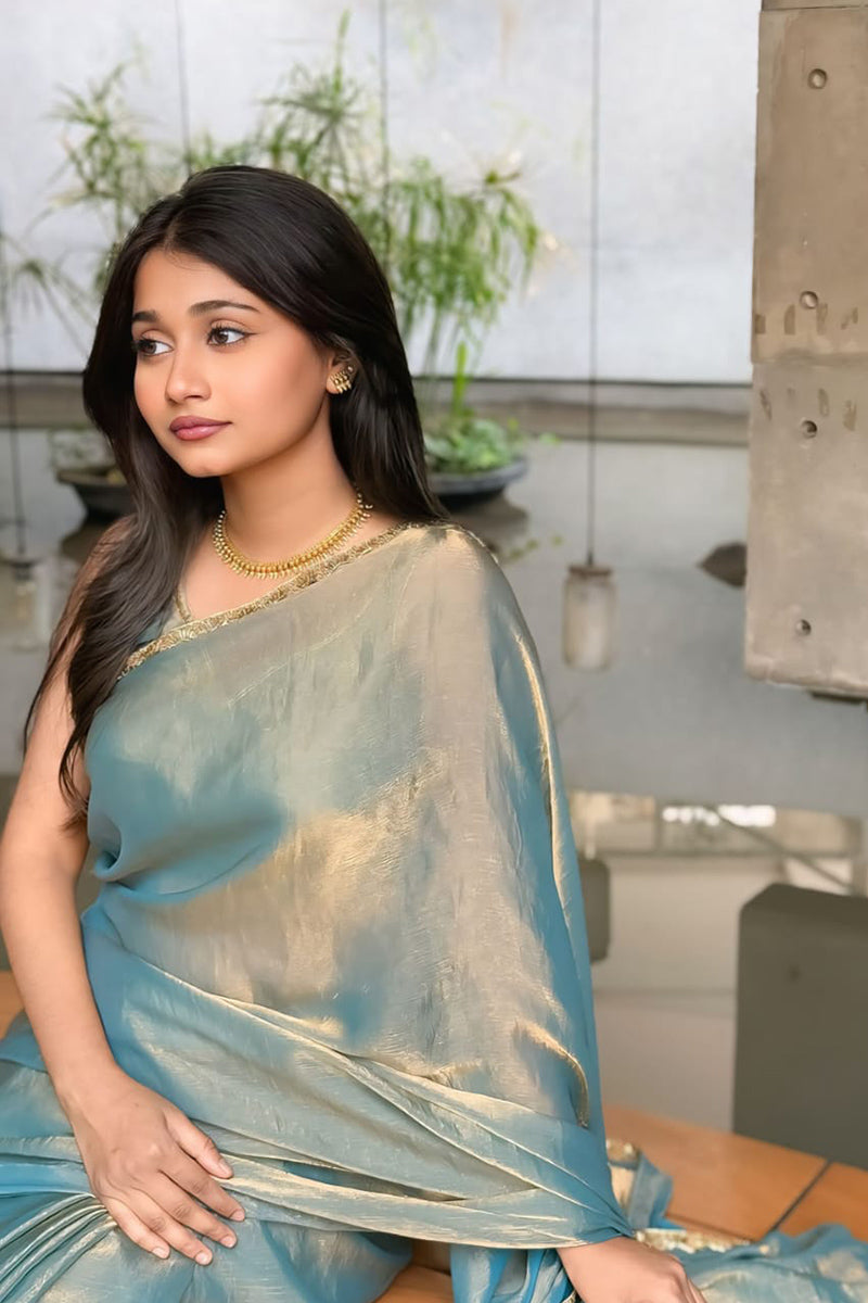 Fancifull Firozi Fancy Silk Saree With Stitched Blouse Piece