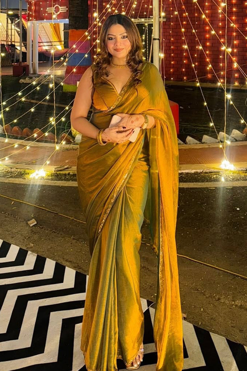 Symmetrical Green Fancy Silk Saree With Stitched Blouse Piece