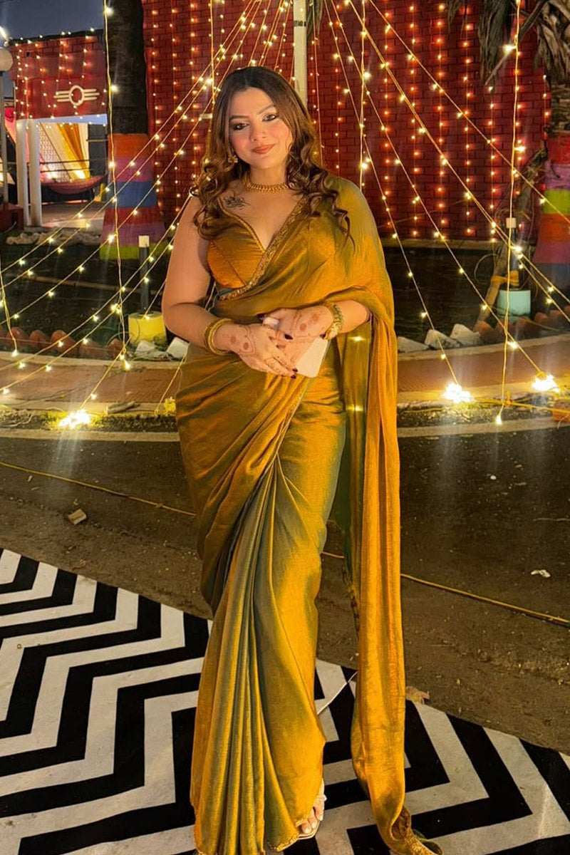 Symmetrical Green Fancy Silk Saree With Stitched Blouse Piece