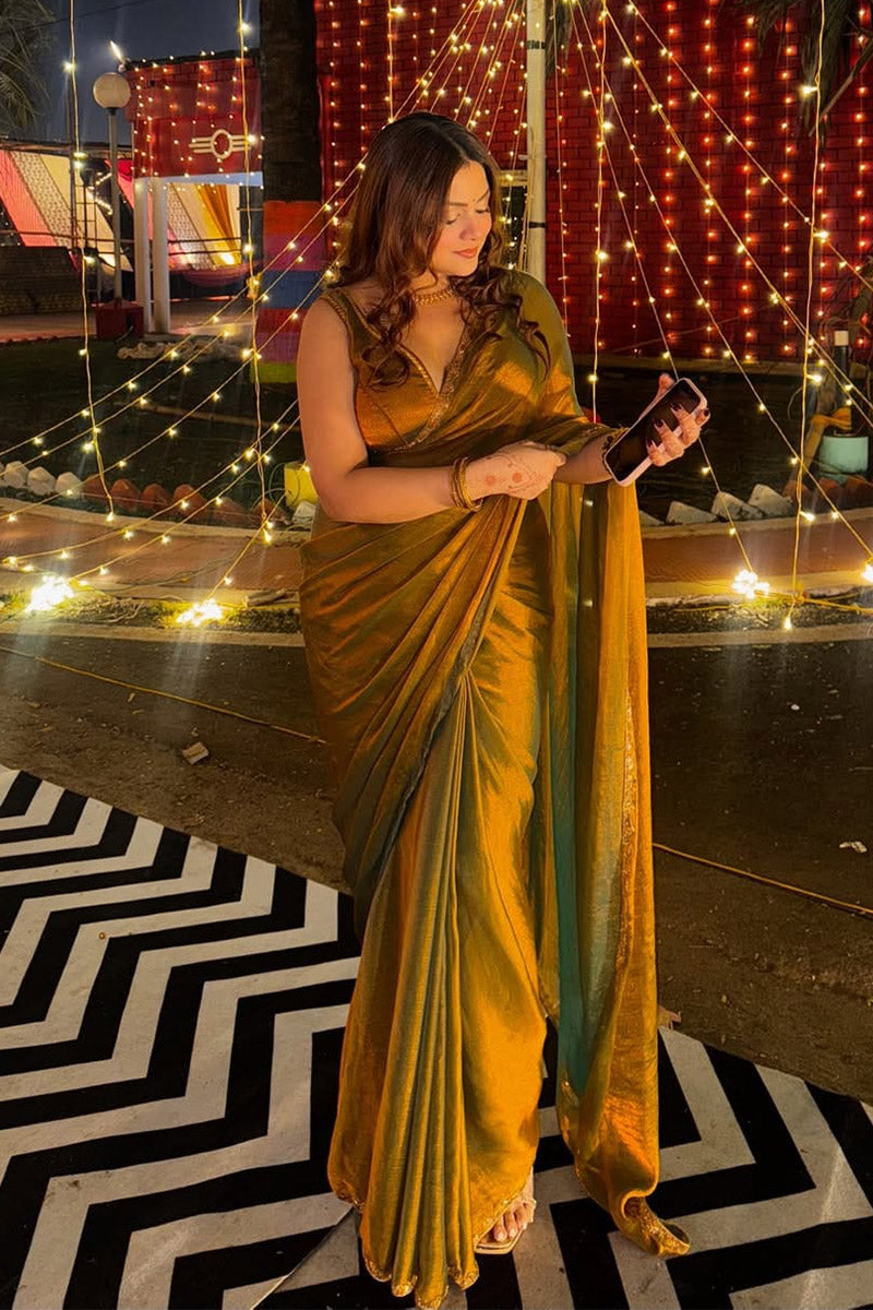 Symmetrical Green Fancy Silk Saree With Stitched Blouse Piece