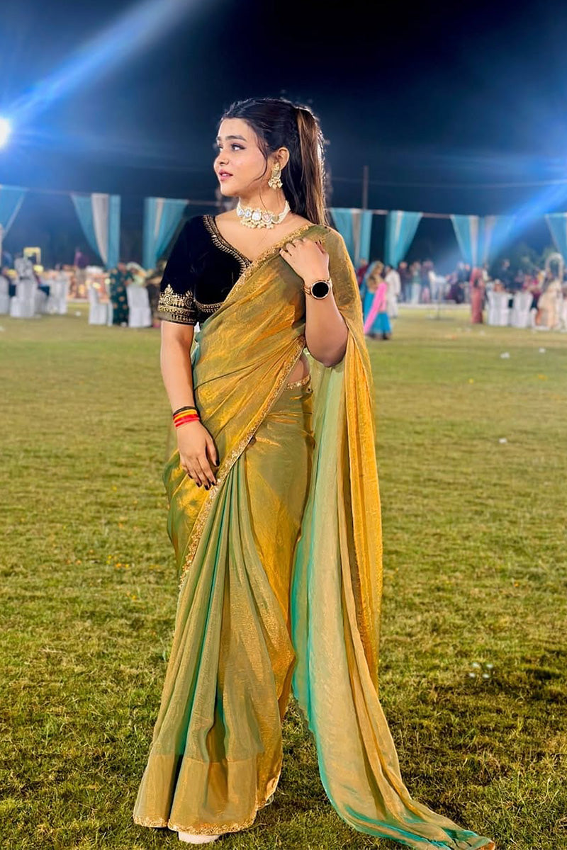 Entrancing Green Fancy Silk Saree With Stitched Blouse Piece
