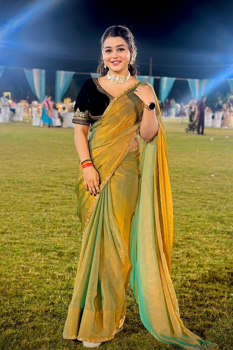 Entrancing Green Fancy Silk Saree With Stitched Blouse Piece