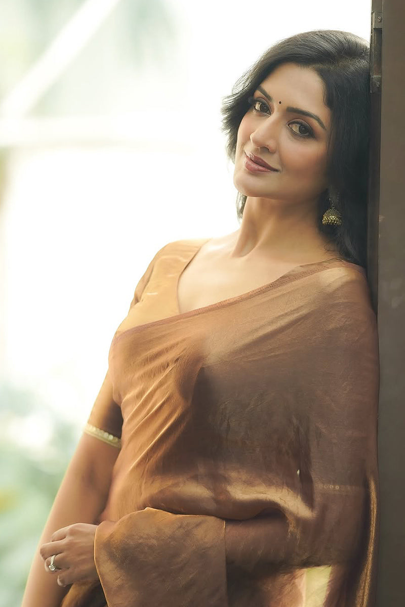 Prominent Brown Fancy Fandy Teby Silk Saree With Stitched Blouse Piece